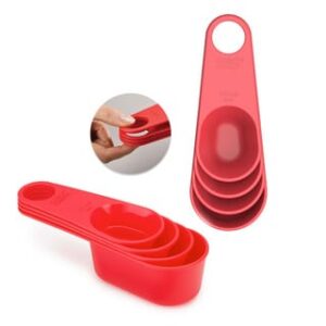 Nesting measuring cup set in red with clip-together handles by Joseph Joseph