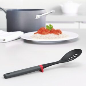 Non-stick safe slotted spoon with integrated rest by Joseph Joseph in Opal color