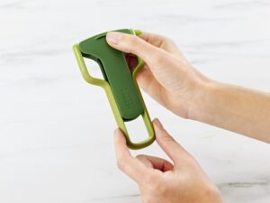 Safety vegetable peeler with blade guard in green from Joseph Joseph, straight blade