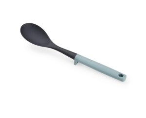 Non-stick safe cooking spoon with tool rest in grey and red from Joseph Joseph