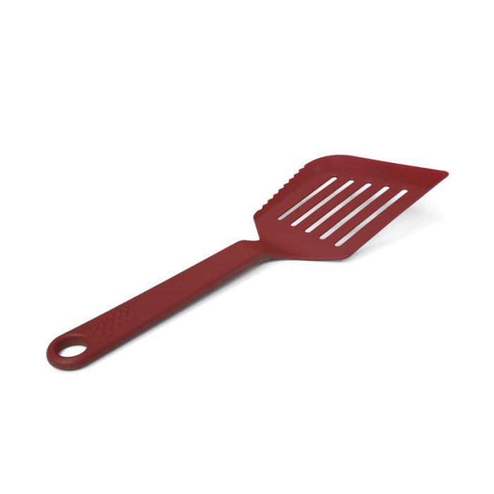 Jumbo kitchen turner in green from Joseph Joseph with serrated edge, non-stick safe