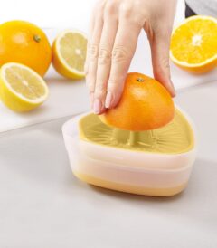Powerful citrus juicer with BPA‑free reversible lid and non-slip base by Joseph Joseph