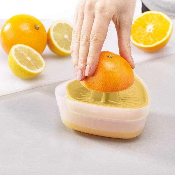 Powerful citrus juicer with BPA‑free reversible lid and non-slip base by Joseph Joseph