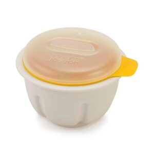 Microwave egg poacher in orange by Joseph Joseph with lift-and-drain colander lid